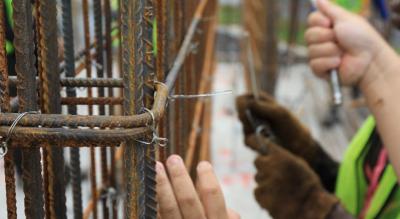 Workers installing the bracing