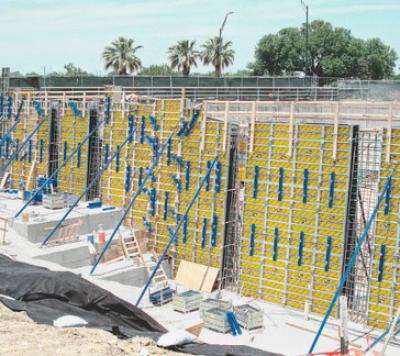 Large gang wall formwork with wide tie spacing in use to reduce foming times