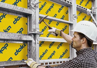 man connecting wall formwork panels with Connectors